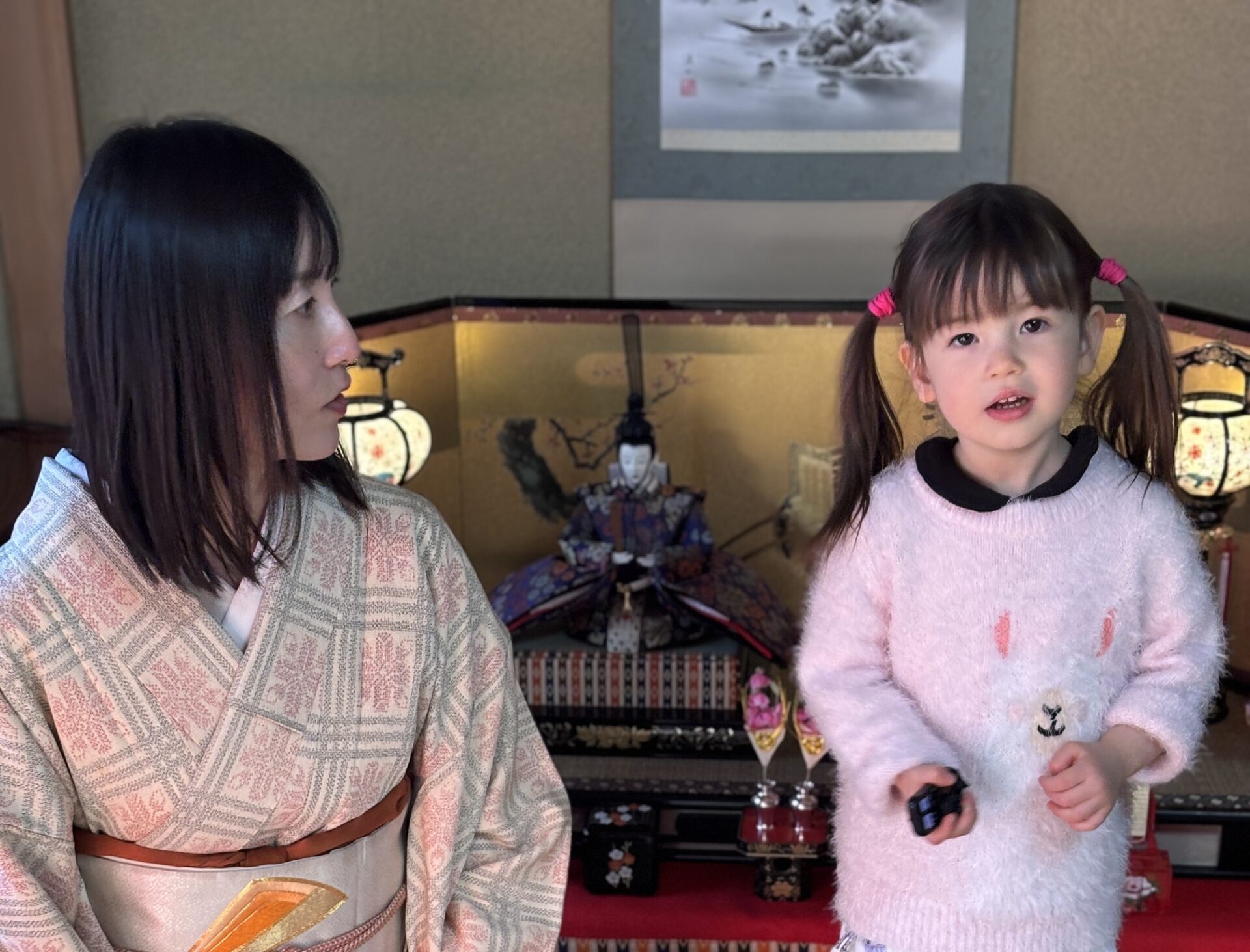 A photo of our guests, one in kimono with Hina dolls.