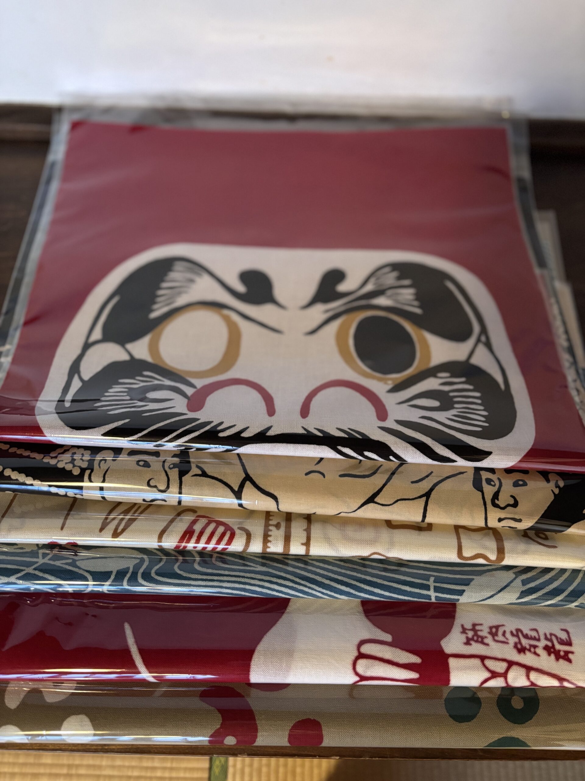 A photo of some tenugui, long thin cotton handkerchiefs.