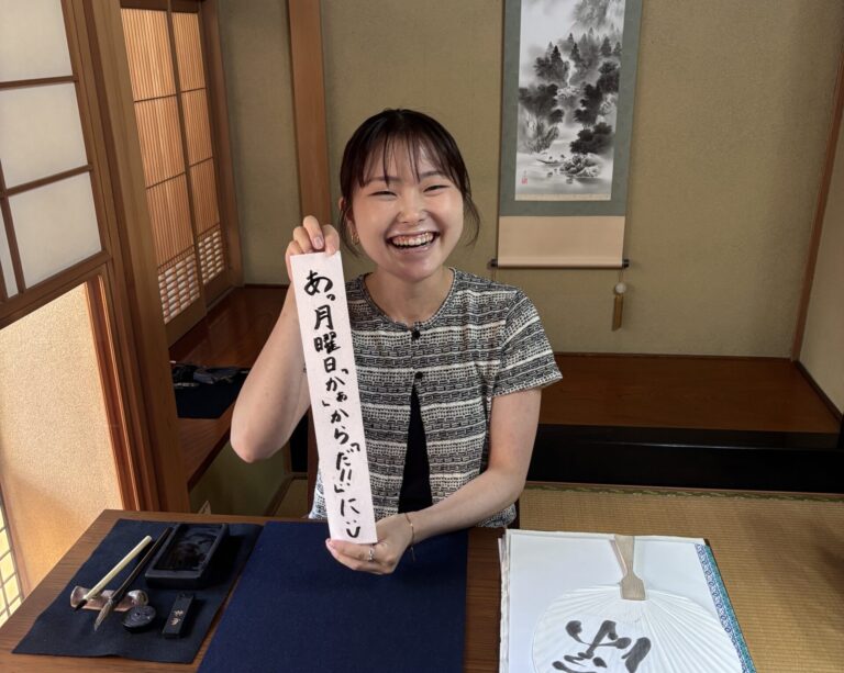 A photo of our guest with the special Tanabata calligraphy.