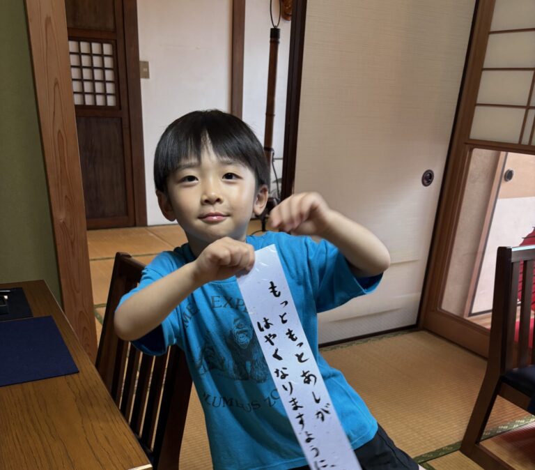 A photo of our guest with the special Tanabata calligraphy.