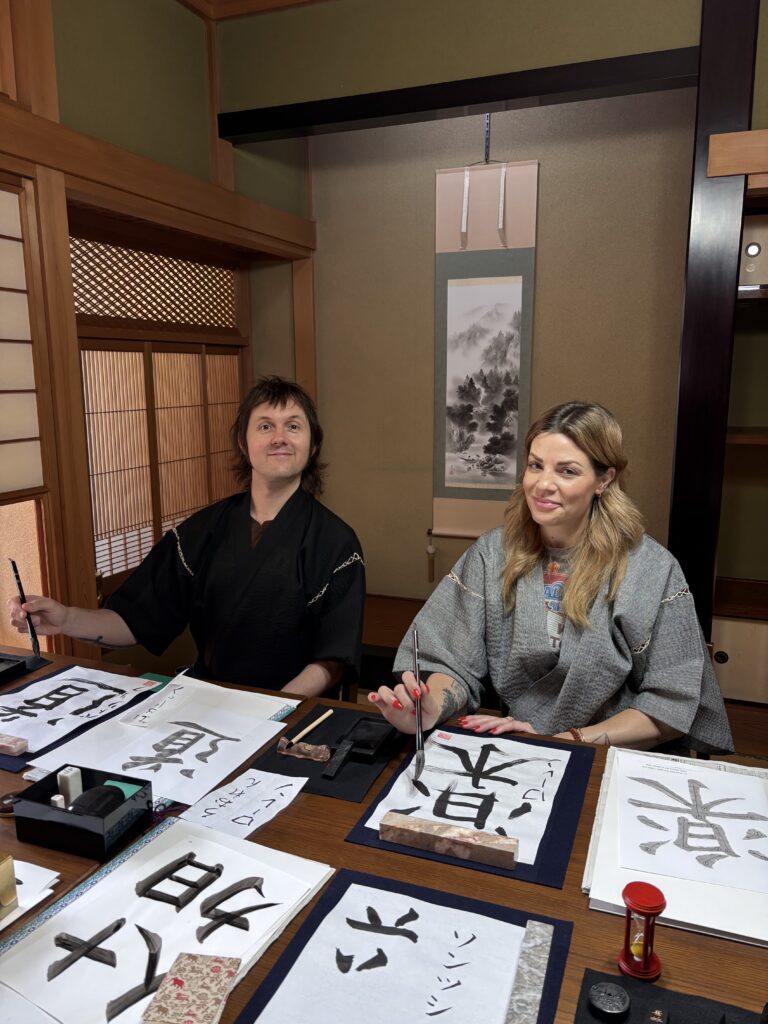 A photo of our guests enjoying the calligraphy.