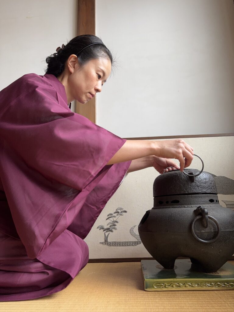 A photo of tea ceremony preparation for local kids.