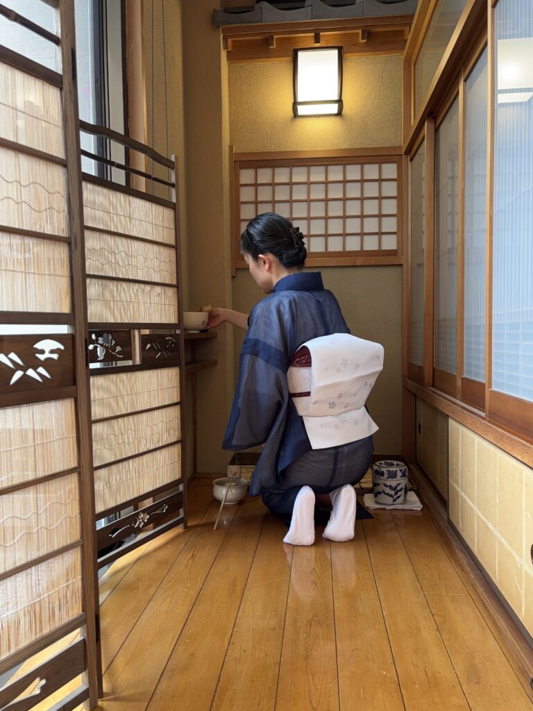A photo of tea ceremony preparation for local kids.