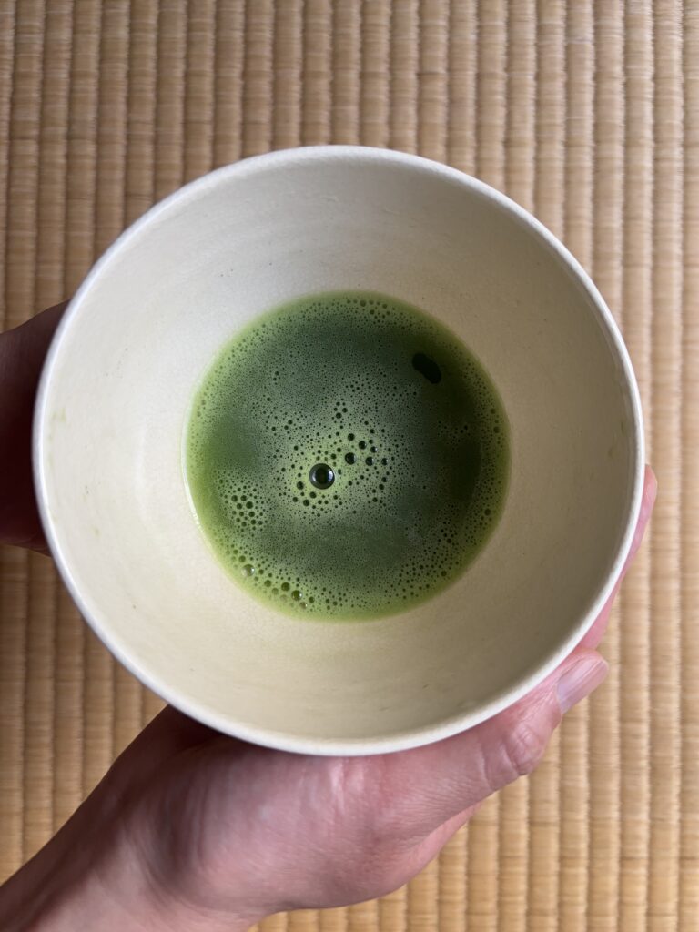 A photo of a cup of matcha.