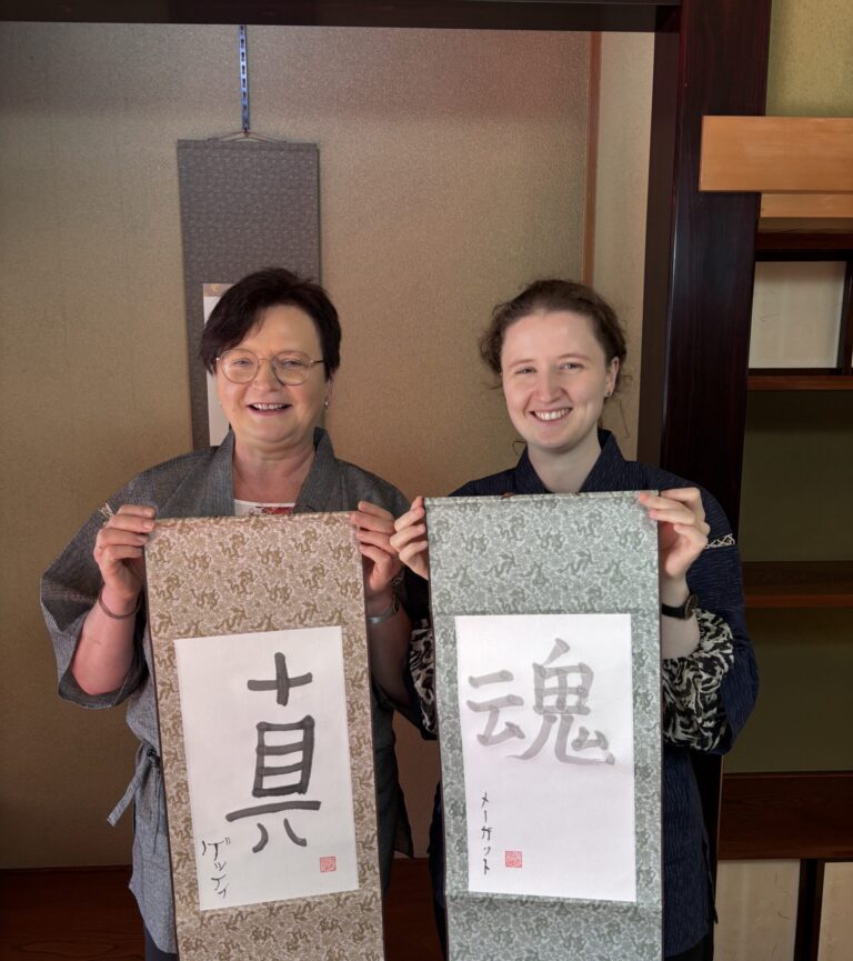A photo of a customer showing their calligraphy work.