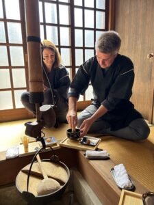 A photo of our guests trying to make a cup of matcha.