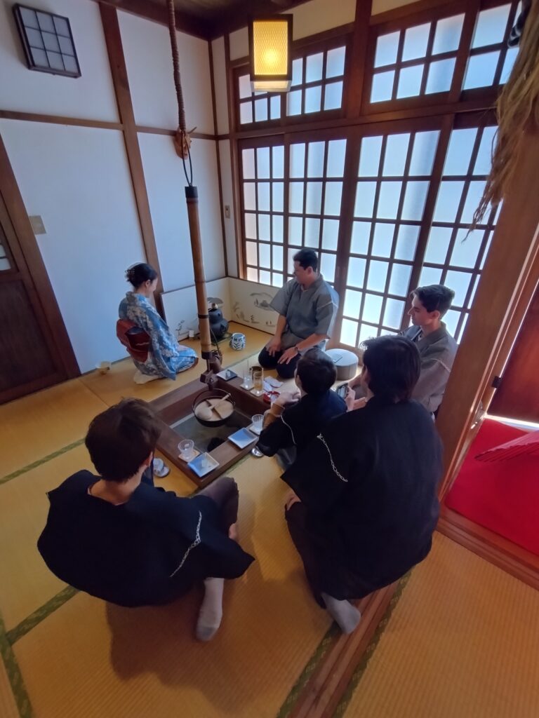 A photo of the tea time followed by the calligraphy experience.