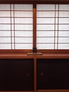 Photo of the entrance shoji screen and incense burner