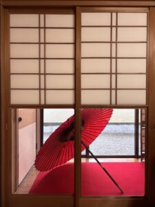 Photo of a red Japanese umbrella.