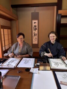 A photo of our guests trying calligraphy.