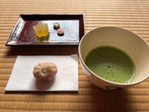 A photo of Japanese sweets and a cup of matcha.