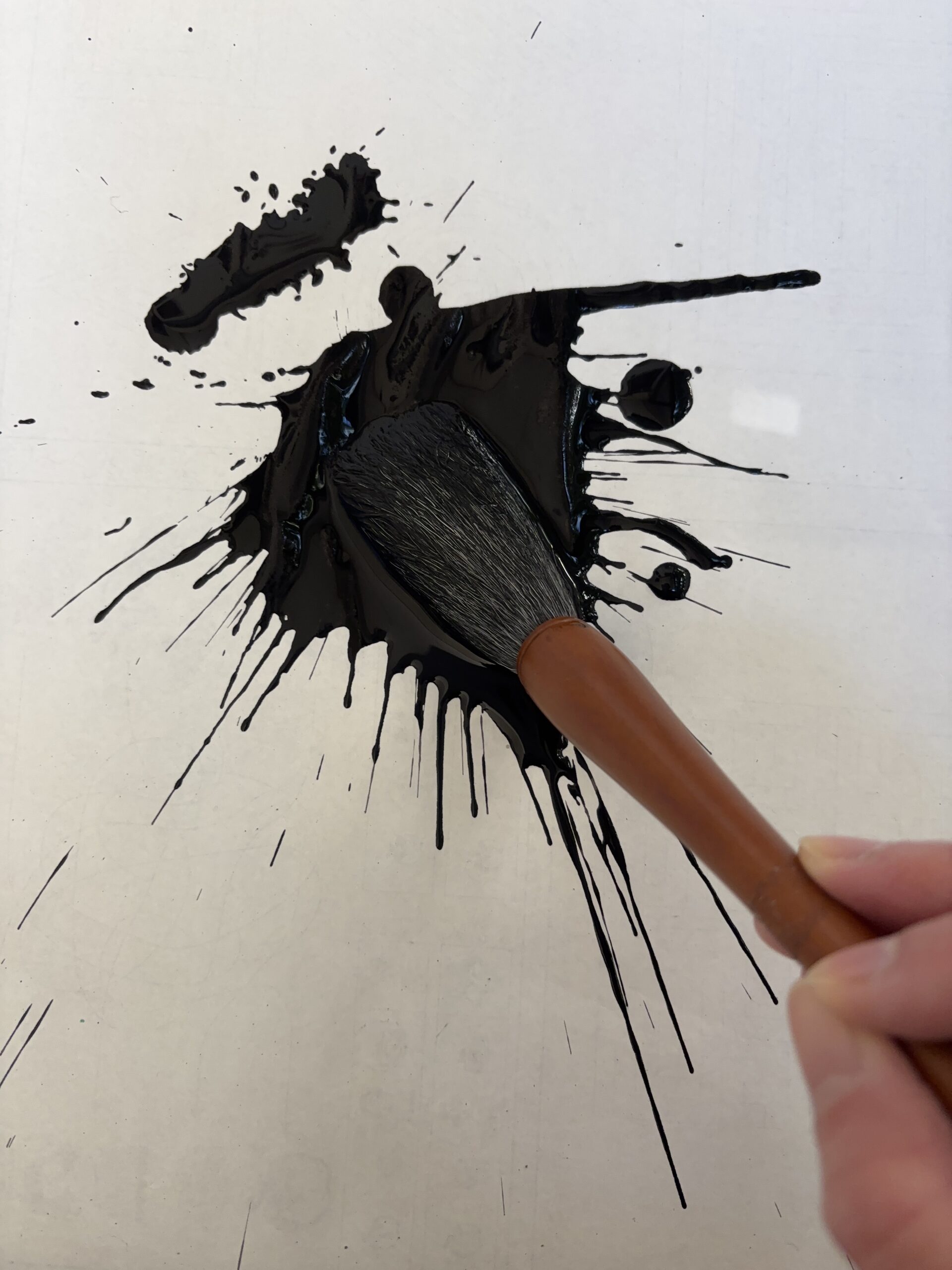 Brush and scattered ink.