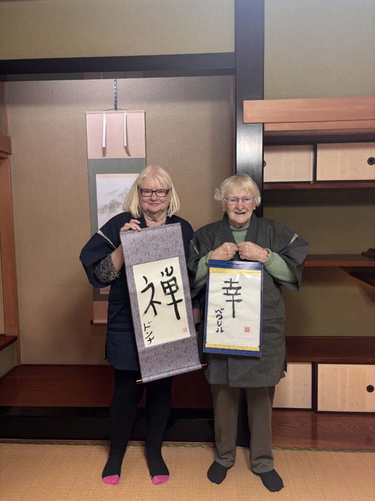 Our guests showing their calligraphy pieces.