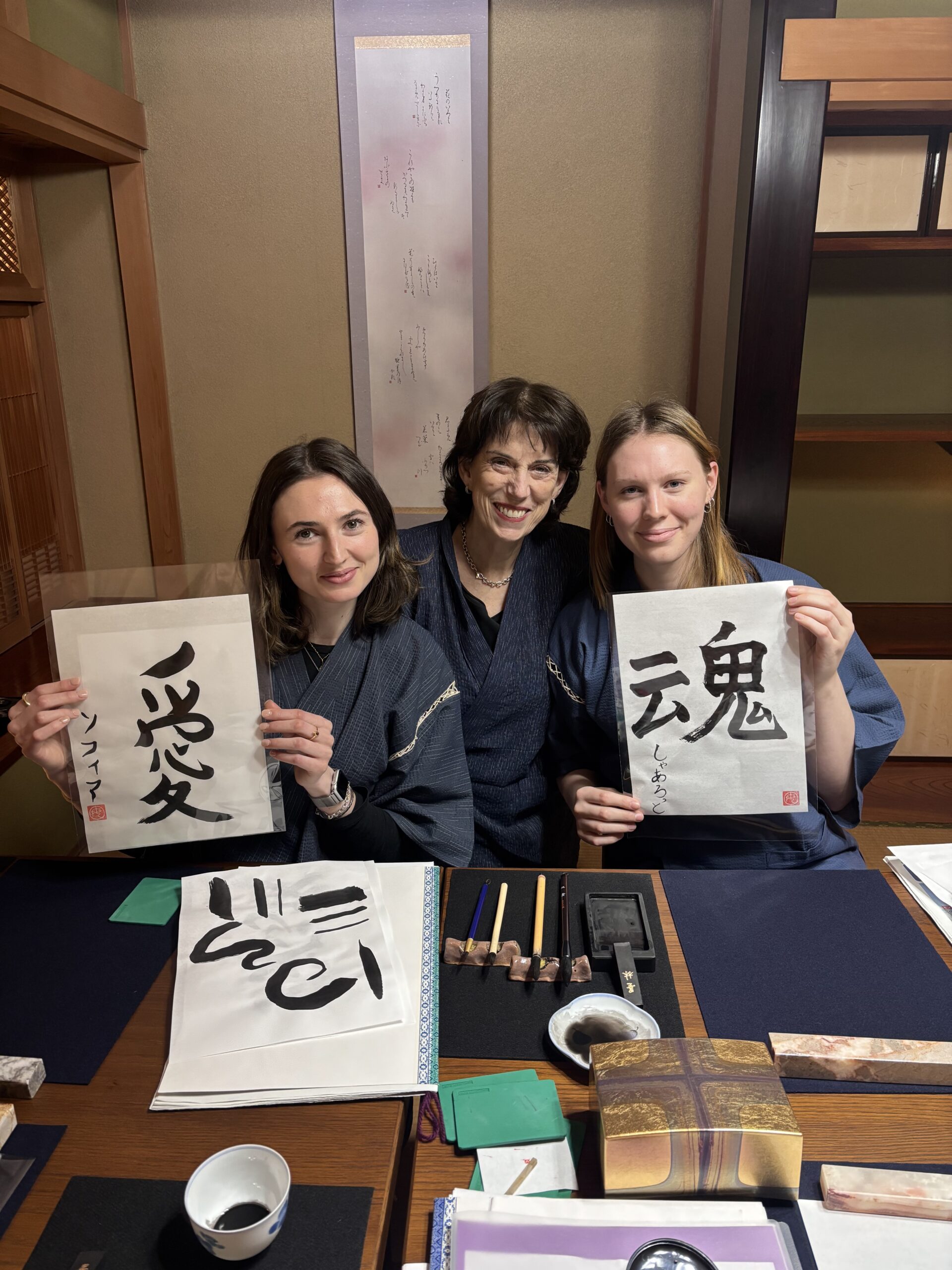 Our guests with their calligraphy pieces "Love" and "Soul".