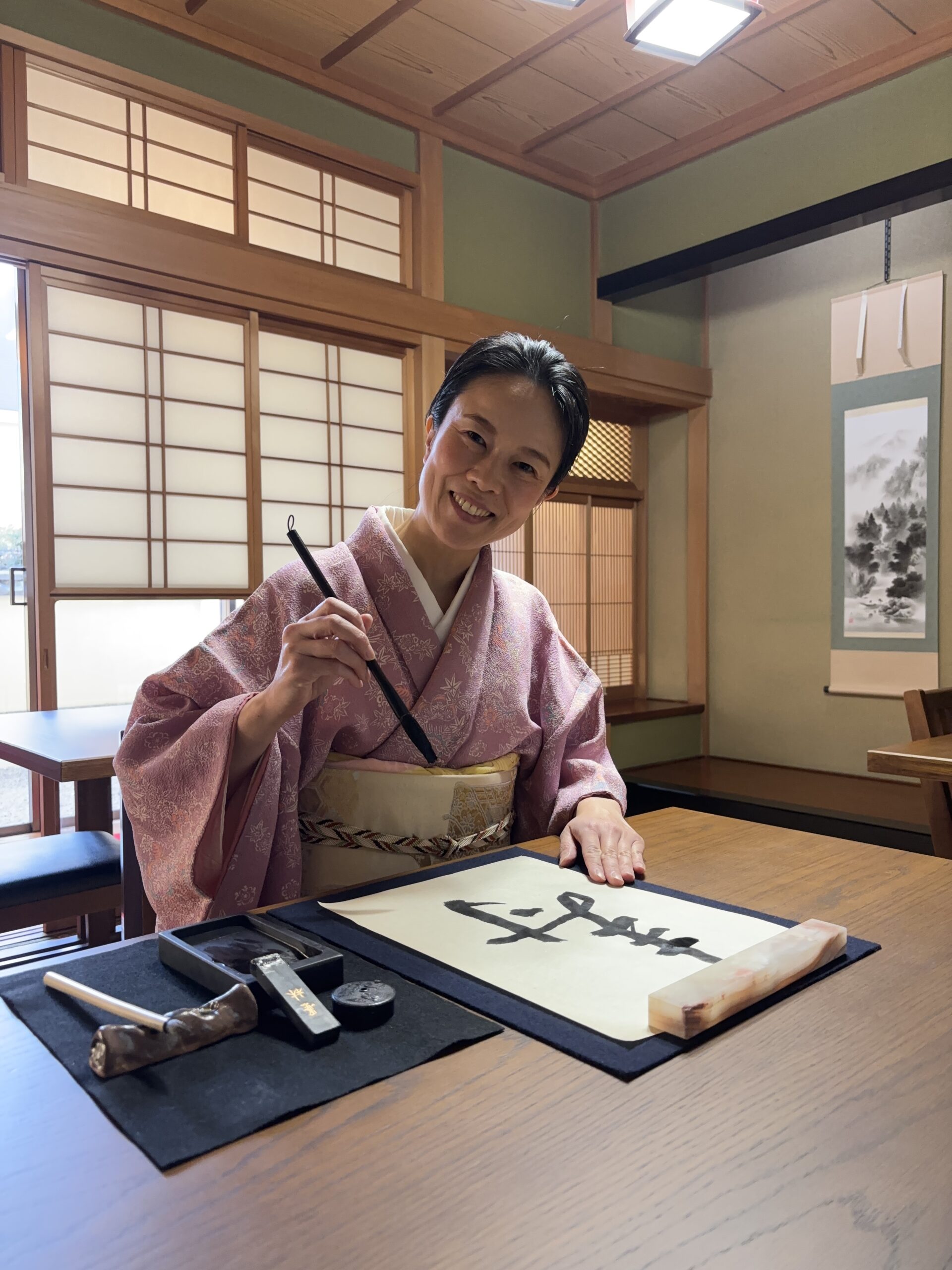 The manager with calligraphy tools