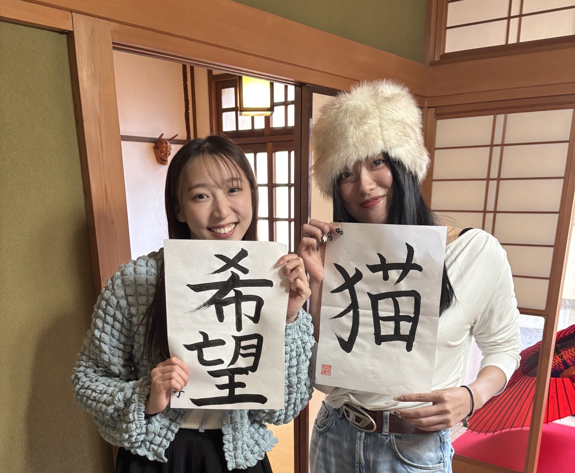 Our guests with their calligraphy pieces.