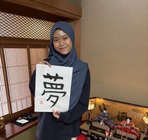 Our guest with her calligraphy piece.