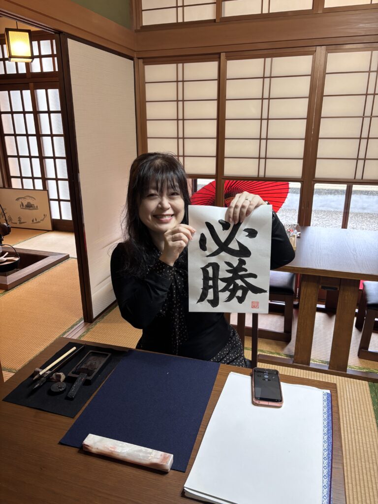 Our guest with her calligraphy piece.