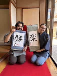 Our guests with their calligraphy pieces.
