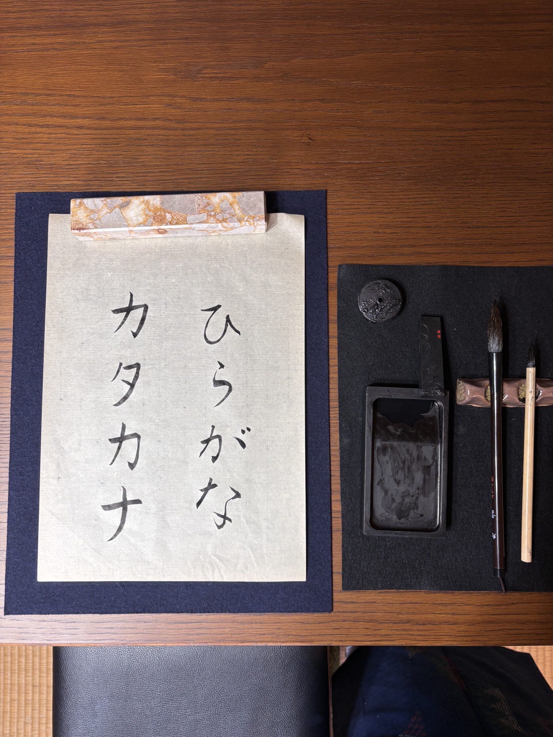 Hiragana and katakana written in calligraphy