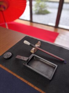 A calligraphy brush.